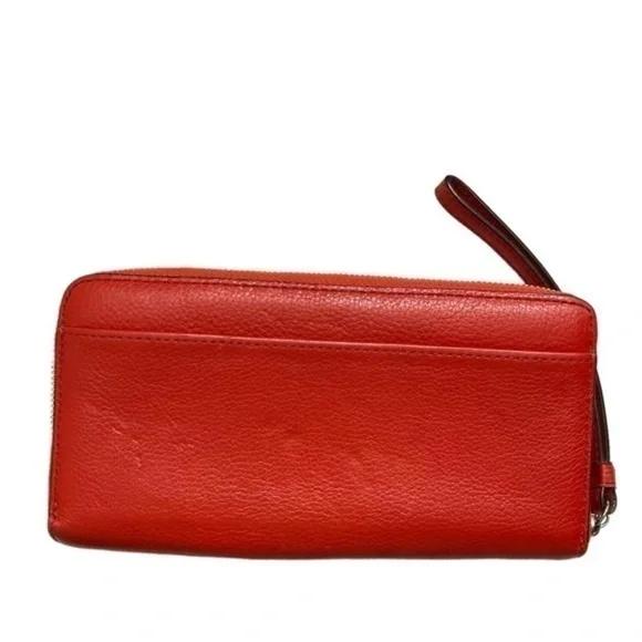 Coach orangy red leather double zipper wristlet clutch bag